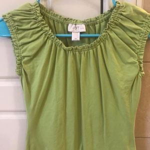 Lime green sleeveless top.